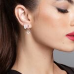 Brinco de prata três aros cravejados zircônia central